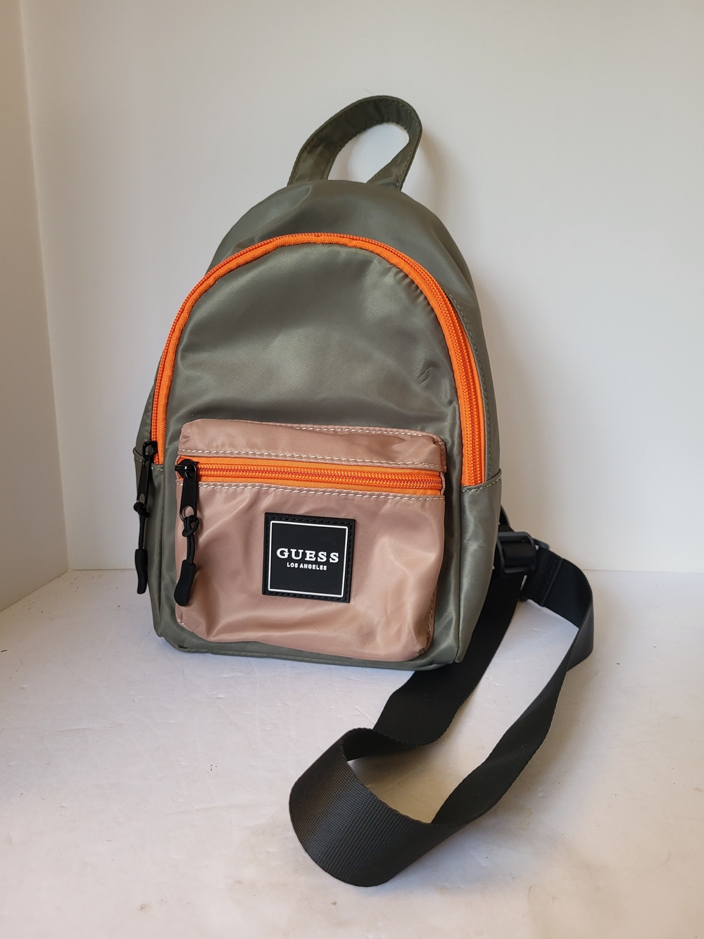 GUESS Men’s Olive Green and Beige Sling Nylon Backpack with Orange Accents